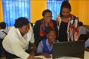 f.l.t.r Ms Mpho lephalo the principal of Mmulakgoro Intermediate, Deputy Minister of Water and Sanitation Pam Tshwete and Deputy Mayor of Mangaung Metro Cllr Connie Rampai with a learner